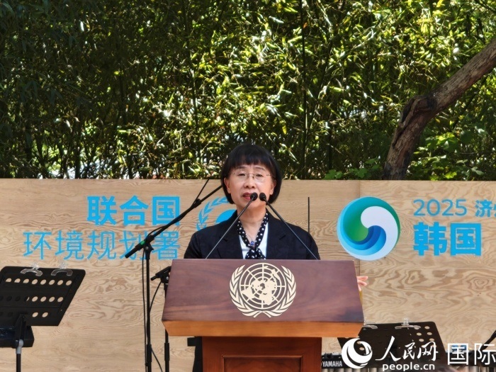 周國(guó)梅致辭。人民網(wǎng)記者 李明攝